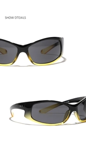 Detail of black gradient frame sunglasses featuring silver star decor and CE marks