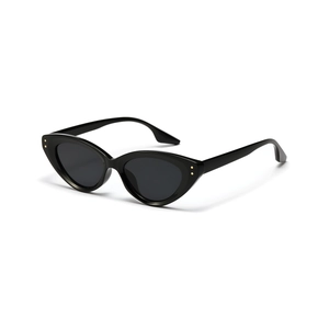 Vintage cat-eye sunglasses in black with gold rivet accents and dark lenses