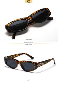 Detail view of tortoiseshell cat-eye sunglasses with silver lightning metal accents