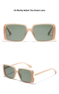 Detail view of rectangular sunglasses in translucent brown frame with dark green lenses