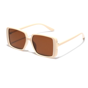 Retro oversized rectangular sunglasses with cream frames and brown tinted lenses