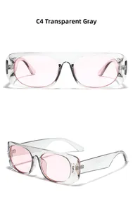 Detailed view of Y2K square sunglasses in transparent grey frame and pink lenses
