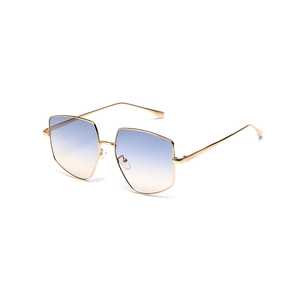 Oversized geometric sunglasses with gold metal frame and blue-to-yellow gradient lenses