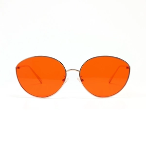Lunettes de soleil ovales punk vintage avec monture en métal doré et verres orange vif