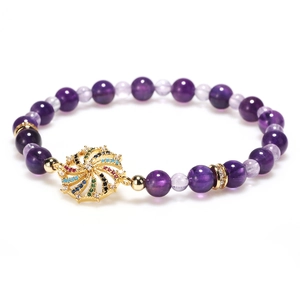 Amethyst bead bracelet with golden sunburst pendant and colorful crystal stones