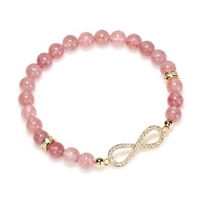 Bracelet en cristal fraise rose avec breloque infini dorée et incrustation de zircon