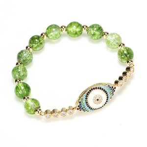 Bohemian Evil Eye beaded bracelet with green cracked stones and sparkling gold accents