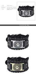 Detailansicht von Punk-Lederarmband mit Bärentatze und nordischen Runen-Metallanhängern