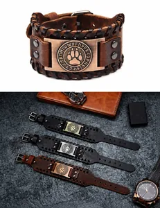 Makro-Detail des Punk-Lederarmbandes mit Bärentatzen-Totem und nordischen Runen-Metallanhänger