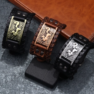 Punk style wide leather cuff bracelets with Nordic wolf metal emblems in multiple colors