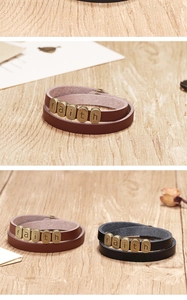 Détails de bracelets en cuir tressé avec perles en bronze gravées du mot faith