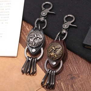 Vintage leather horse keychain with embossed alloy charms and four separate hanging hooks