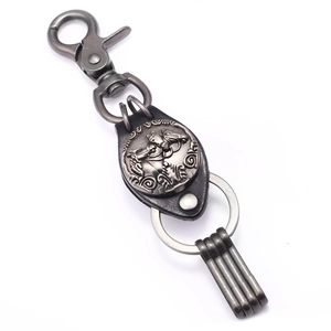Retro horseshoe keychain with silver horse relief and premium leather backing for key storage
