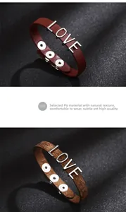 Detailed macro view of PU leather bracelets featuring silver LOVE letters and snap closure