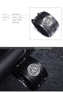 Macro detail of punk leather cuff bracelet with skull charm and silver rivets