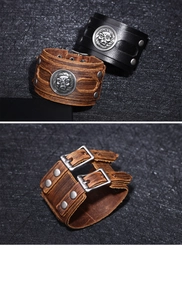 Detail of vintage punk leather bracelets with skull badges and adjustable metal buckles