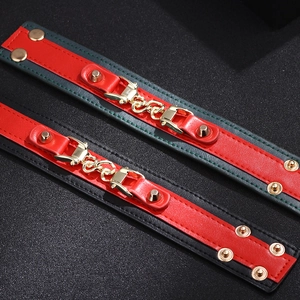 Punk style PU leather bracelet with gold chain and rivets in red and green colors