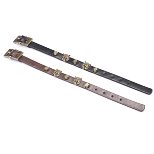 Vintage leather tiger head bracelets in black and brown with antique bronze hardware