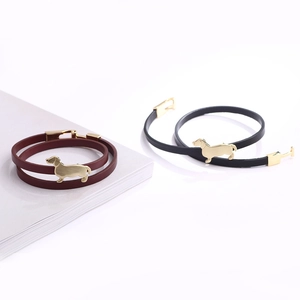 Minimalist leather wrap bracelets with gold dachshund charms in burgundy and black
