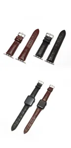 Détail des bracelets en cuir de crocodile pour Apple Watch en marron et noir avec boucles