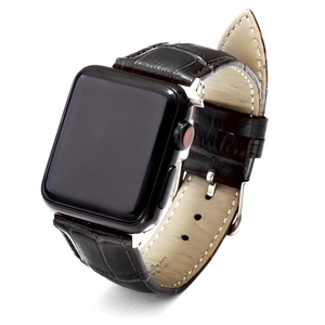 Dark brown crocodile leather strap for Apple Watch with silver buckle and fine stitching