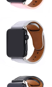Detail of premium PU leather watch bands in pink, white, and black for smartwatches