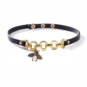 Vintage leather choker with gold hexagonal rings and pearl bee pendant decoration