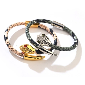 Snake pattern bracelets in gold and silver with micro-pave cubic zirconia accents