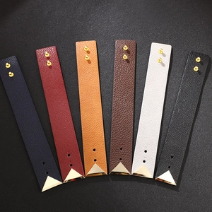 Minimalist wide PU leather bracelet with gold metal rivets available in six vibrant colors