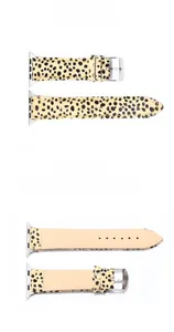 Macro view of leopard print calf hair leather watch strap with silver stainless buckle