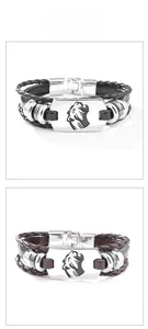 Dettagli di bracciali in pelle intrecciata multistrato con placca leone in metallo