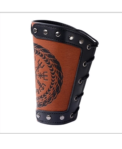 Detail of Viking compass print on brown textured leather bracer with metal rivets