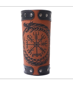 Close-up of brown leather arm guard featuring Viking compass and Ouroboros symbol