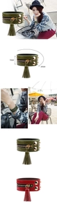 Detailansicht eines breiten Lederarmbands mit Reißverschluss, Quaste und Nieten in 3.1cm