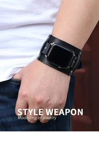Macro shot of punk style black leather wide strap for smartwatches with silver rivets