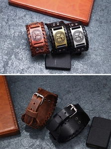 Viking leather bracelets with Norse rune metal discs and adjustable buckle closure