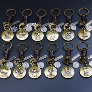 Porte-clés en Cuir Signe du Zodiaque Vintage Hommes Femmes Rétro Bronze Constellation Pendentif Rond Style Punk Anneau de Clé