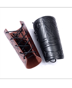 Detail of Viking leather bracers with Valknut embossing and adjustable lace-up ties