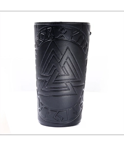 Detail of black leather arm guard with embossed Valknut symbol and Viking runes