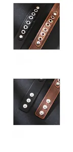 Detailed macro view of vintage genuine leather wristband featuring metal stud hardware