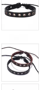Detail of punk leather bracelet with brass eyelets and adjustable drawstring closure