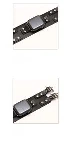 Detail view of black genuine leather Apple Watch strap with punk style silver metal rivets