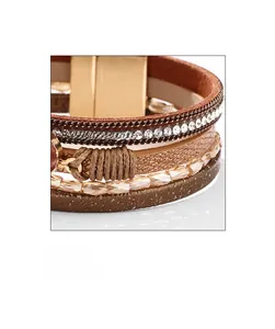 Detail of multi-layer brown PU leather bracelet with crystals and gold magnetic clasp