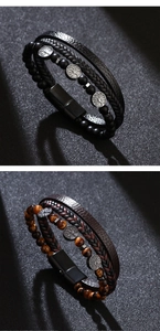 Detail of multi-layer leather bracelets with Tiger Eye beads and Tree of Life charm