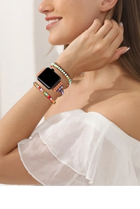 Detail of bohemian multilayer beaded strap with turquoise stones for Apple Watch