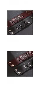 Detail of shield cross embossing and metal studs on vintage leather bracelet bands