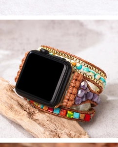 Detail of bohemian wrap watch band featuring natural blue stones and woven leather straps