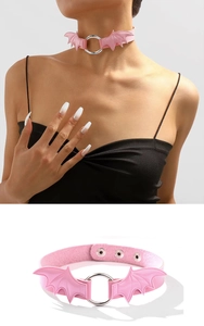 Pink gothic bat wing choker with silver ring detail and adjustable metal buckles