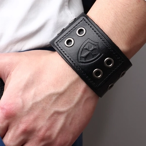 Classic vintage black leather wristband with embossed cross shield for men's punk style