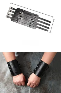 Detailed size chart for black punk leather wrist guard with four adjustable metal buckles